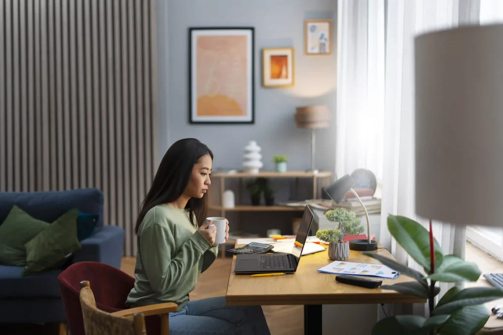 woman on a workation in a studio apartment